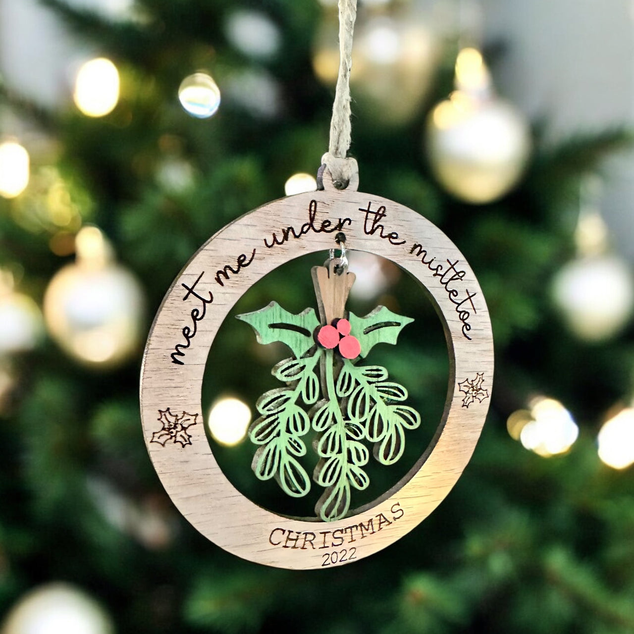 Under the mistletoe ornament, present, decor, Christmas