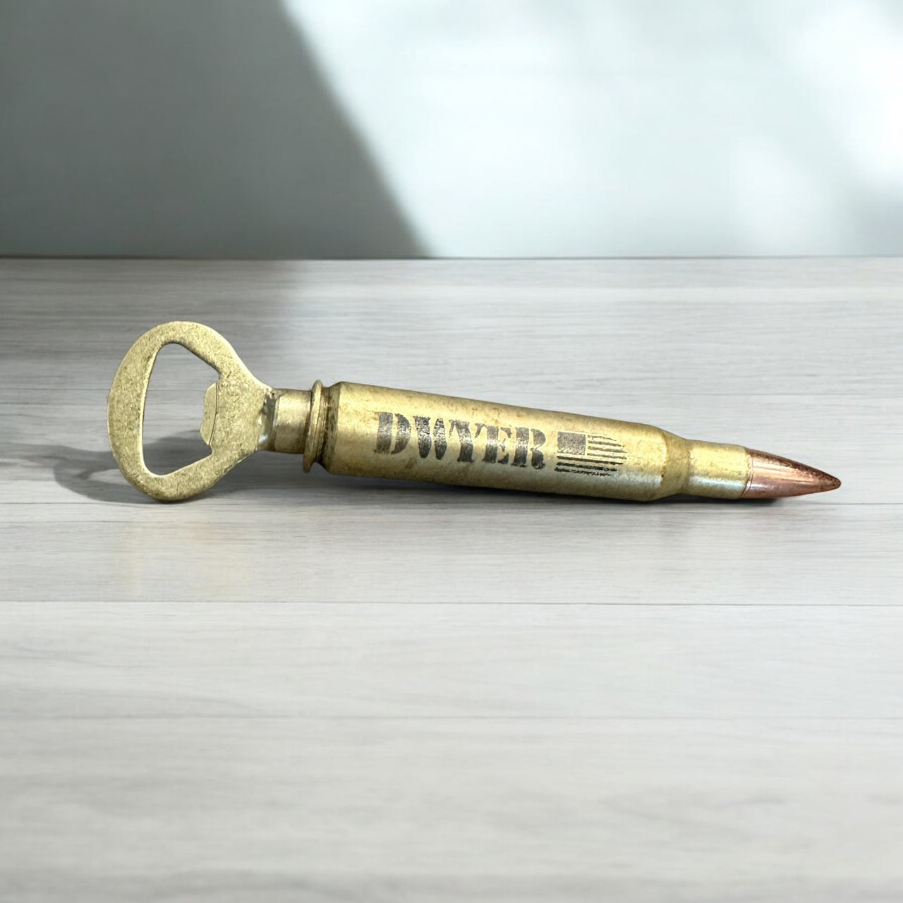 50 caliper bullet bottle opener